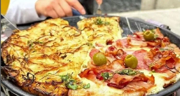 Pizza argentina gigante con mucho queso